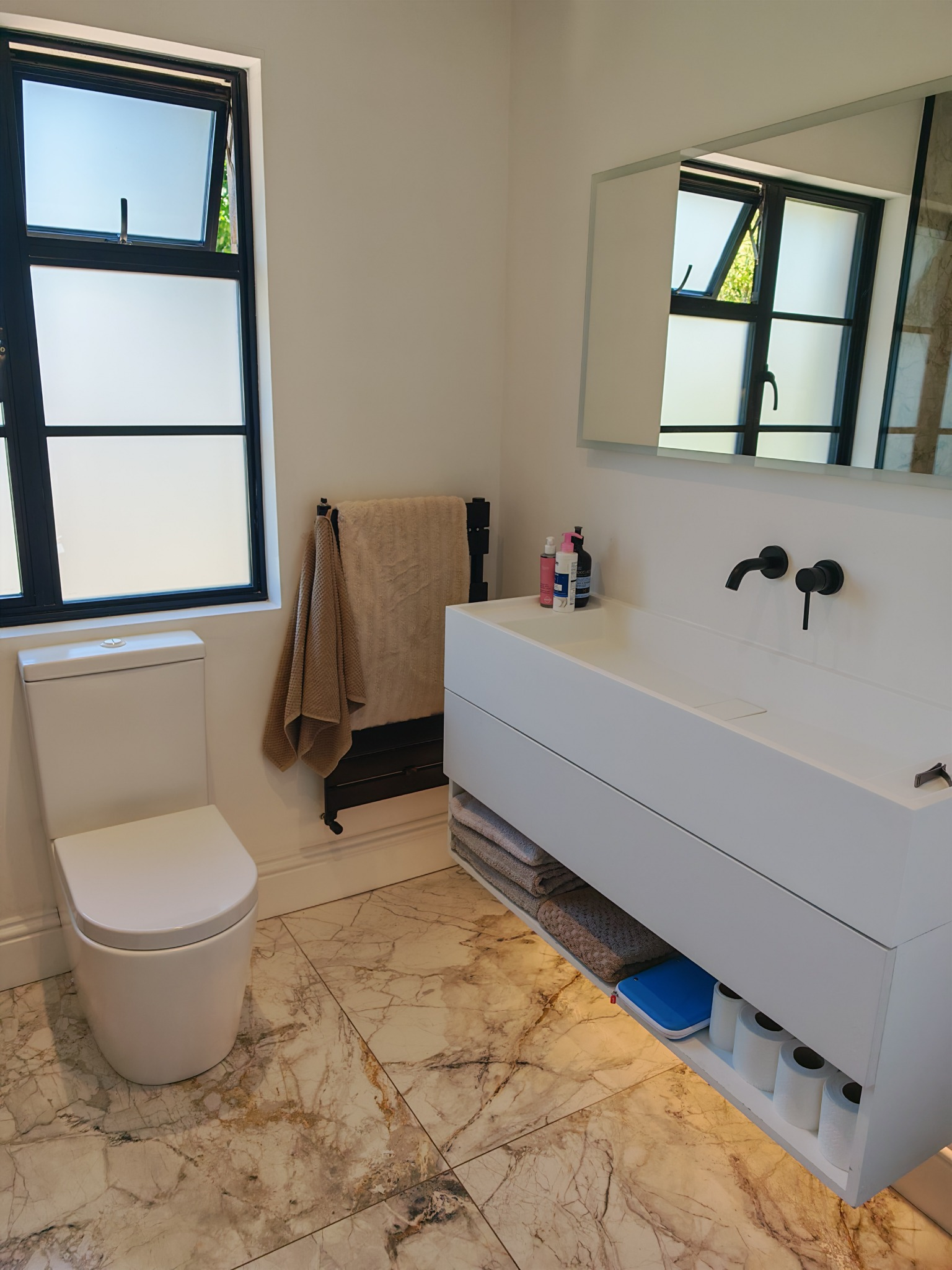 Clean modern marble bathroom
