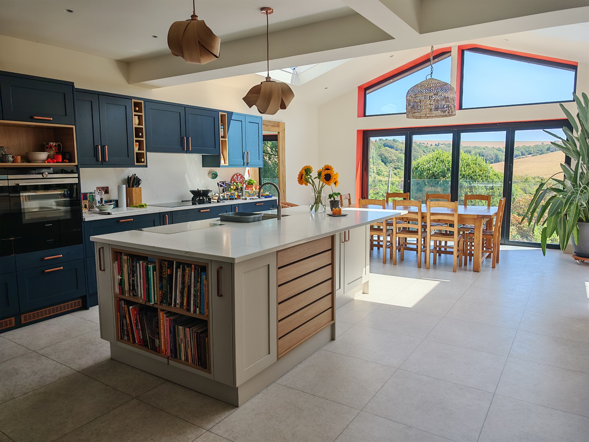 Bespoke blue kitchen in a high-end home cleaned by TipTop