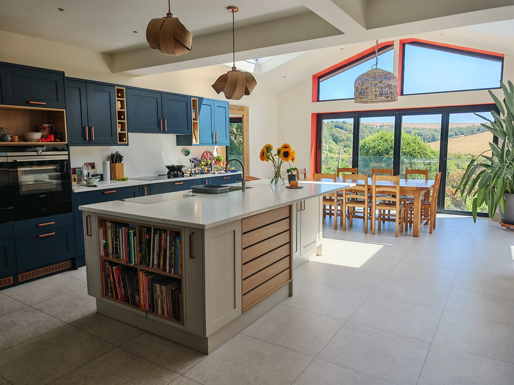 Bespoke blue kitchen in a high-end home cleaned by TipTop